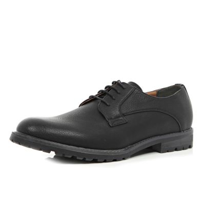 Black cleated sole shoes